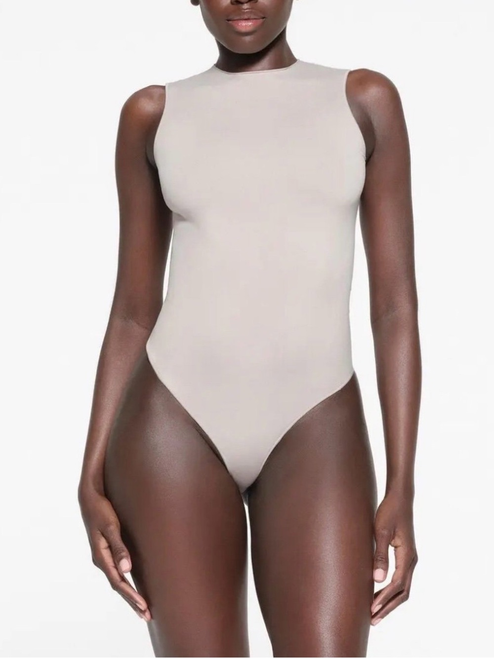 SKIMS Essentials Sleeveless Crew Neck Bodysuit in Taupe